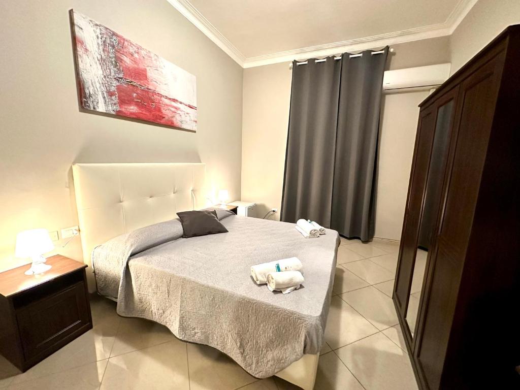 Posteľ alebo postele v izbe v ubytovaní Golden Milano Hotel
