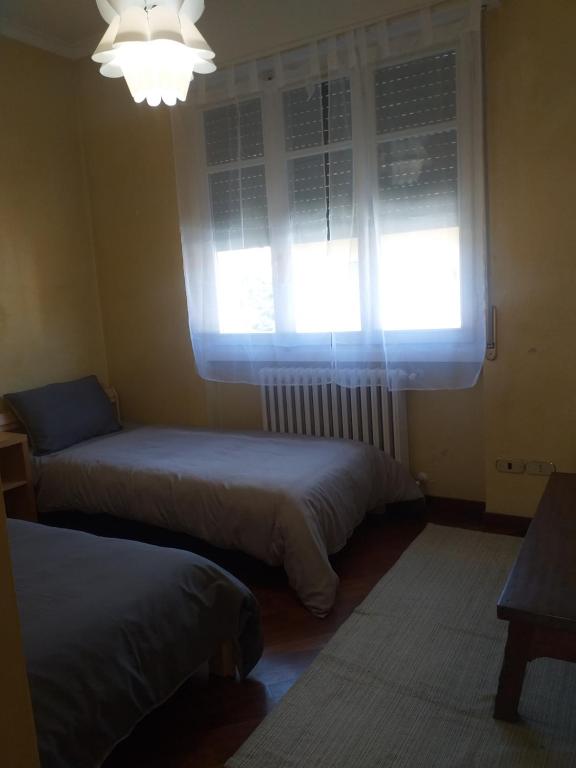 Postel nebo postele na pokoji v ubytování Casa Patrone appartamento Luigi