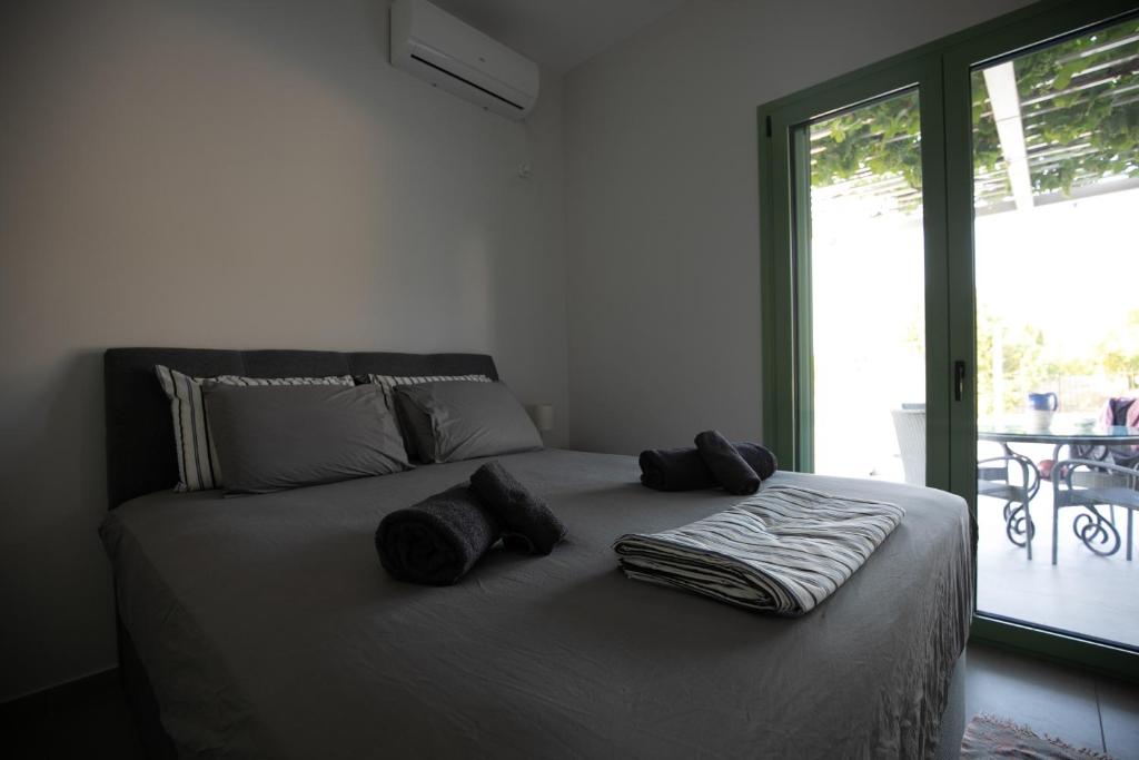Postel nebo postele na pokoji v ubytování Pine House