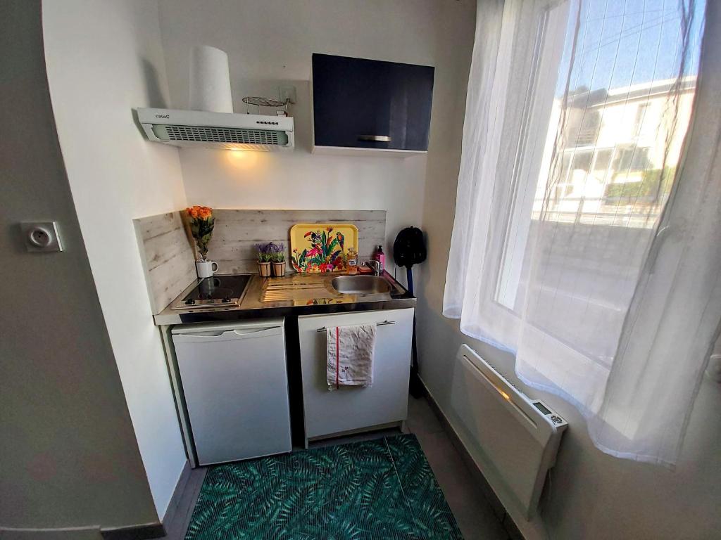 Una cocina o kitchenette en Le Havre - appartement cosy - Avec Netflix