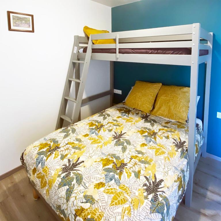 Postel nebo postele na pokoji v ubytování Auberge des Plaines - Appart'hôtel