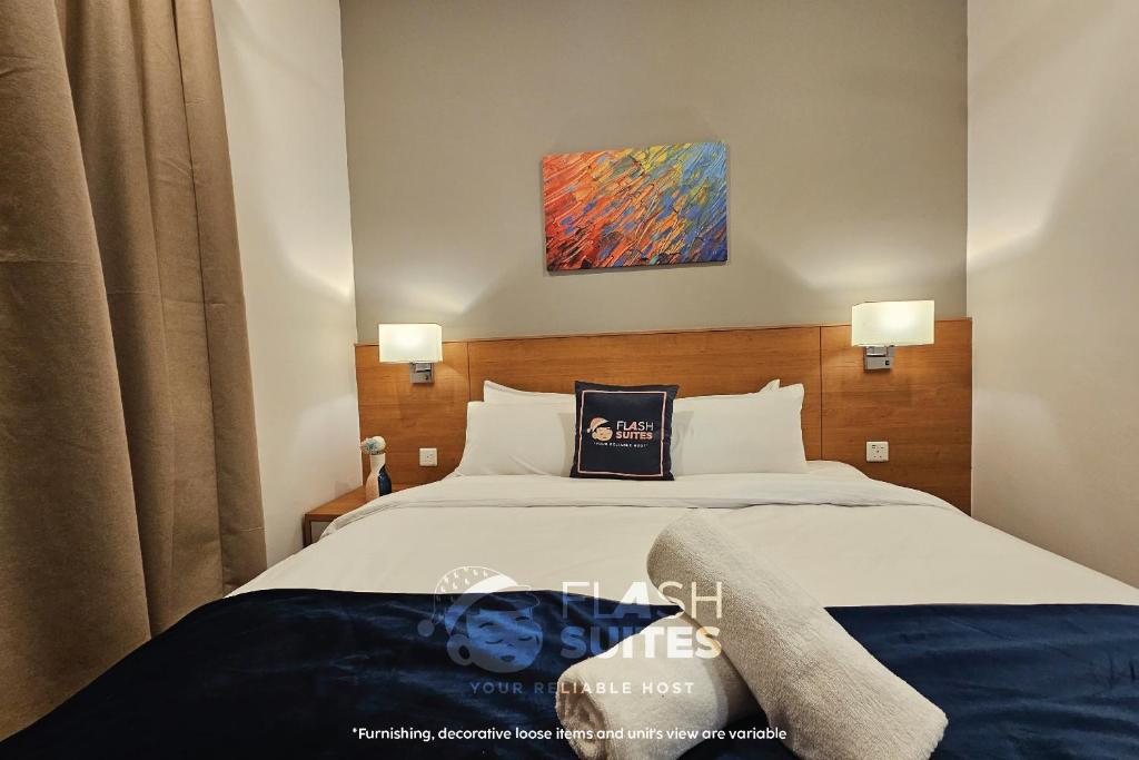 Postel nebo postele na pokoji v ubytování Onsen Premium Suites @ Tambun Ipoh