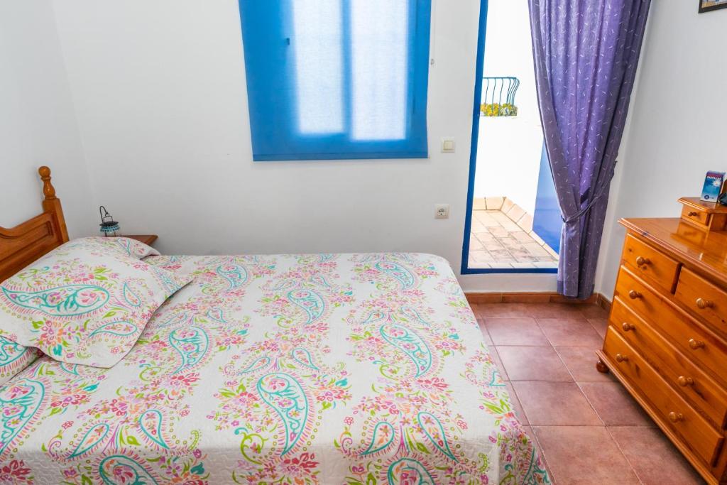 Postel nebo postele na pokoji v ubytování Casa Marinero - Patio Andaluz