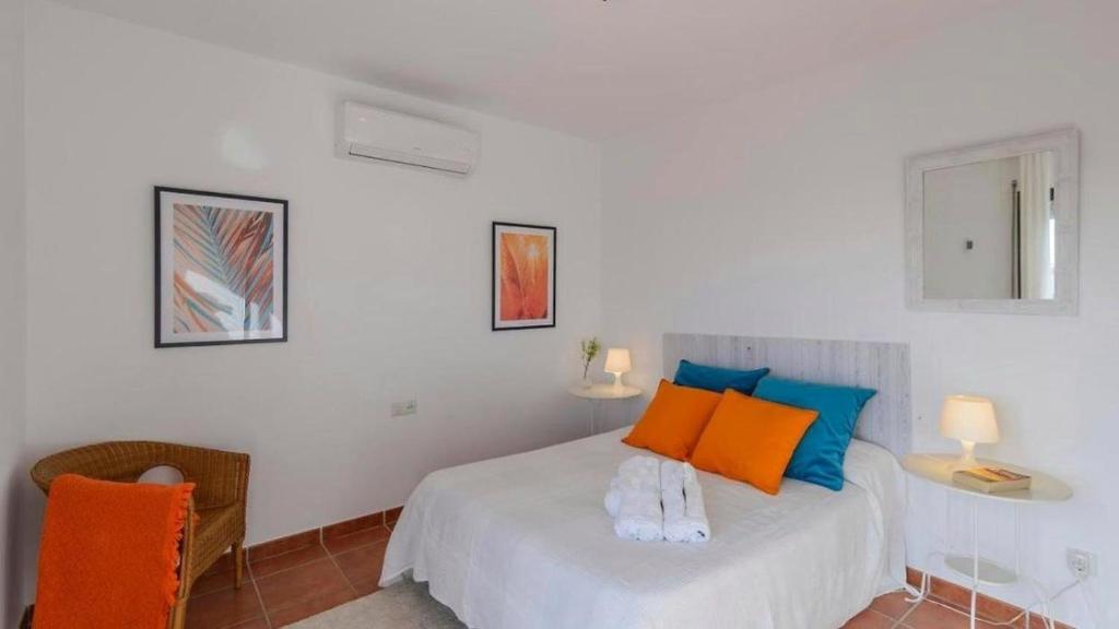 Postel nebo postele na pokoji v ubytování VILLA CARMEN MENYBER