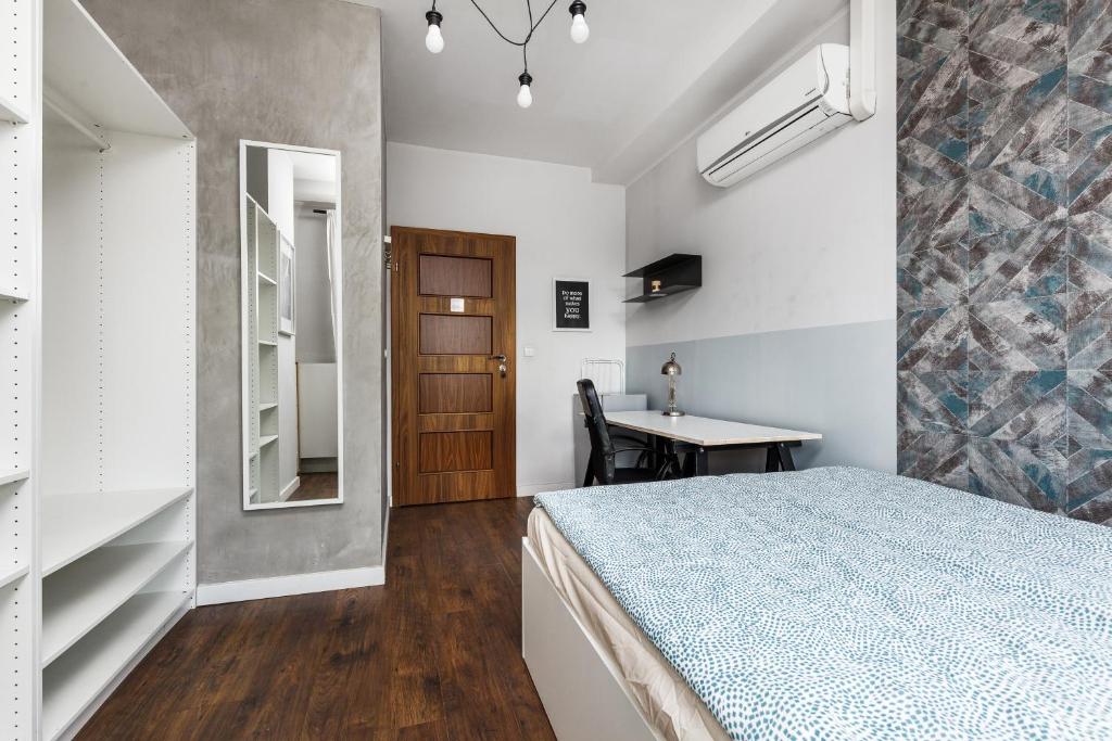 Postel nebo postele na pokoji v ubytování Quattro Loft Hostel
