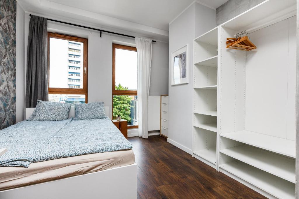 Postel nebo postele na pokoji v ubytování Quattro Loft Hostel