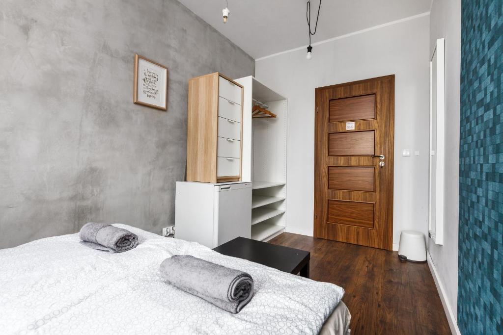 Postel nebo postele na pokoji v ubytování Quattro Loft Hostel