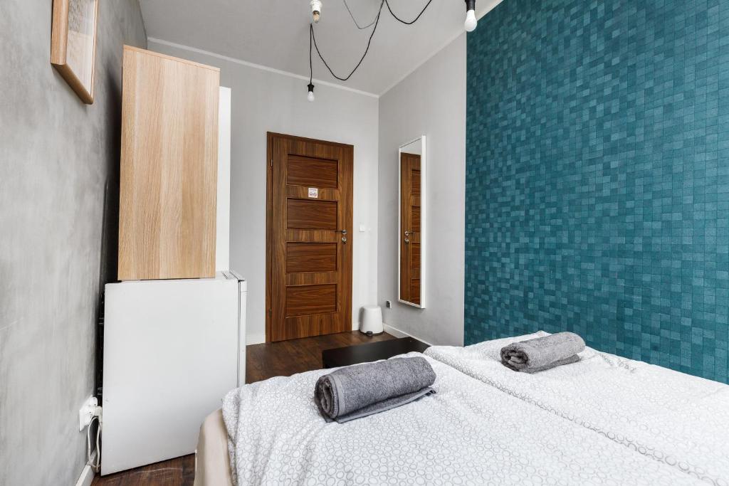 Postel nebo postele na pokoji v ubytování Quattro Loft Hostel