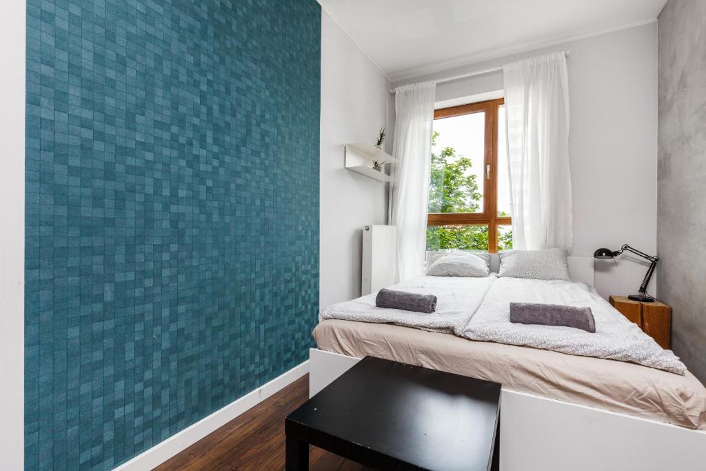 Postel nebo postele na pokoji v ubytování Quattro Loft Hostel