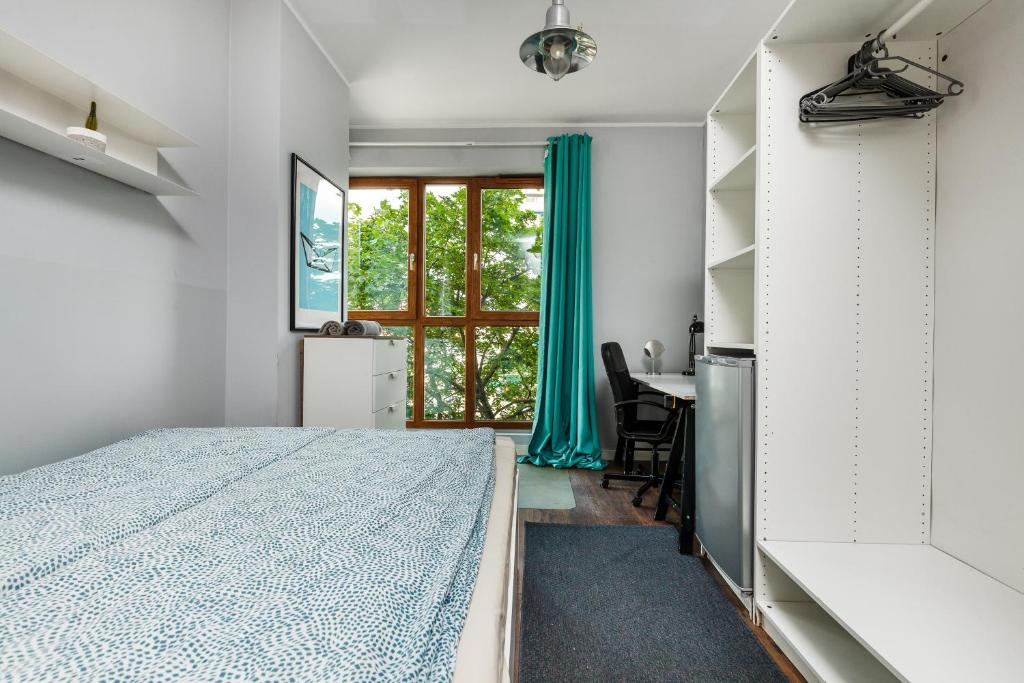 Postel nebo postele na pokoji v ubytování Quattro Loft Hostel