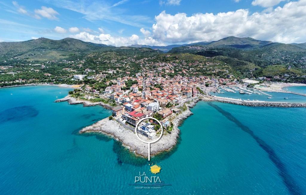 an aerial view of a small island in the water at Residence La Punta in Marina di Camerota