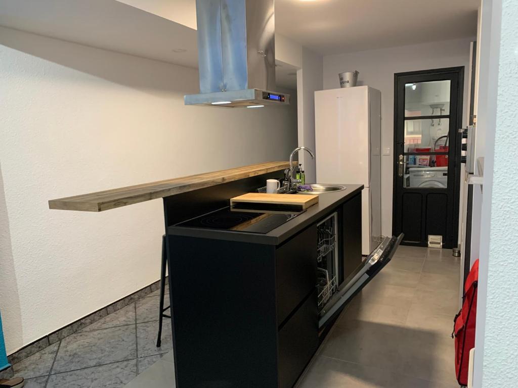 Kuchyňa alebo kuchynka v ubytovaní Magnifique Appartement • vue sur mer • Santa Pola