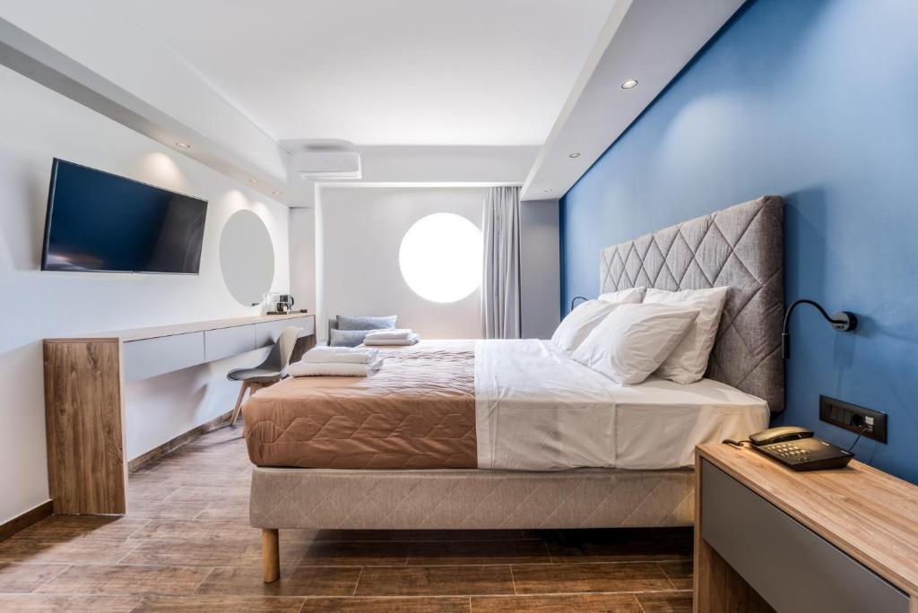Postel nebo postele na pokoji v ubytování Island City Boutique Hotel
