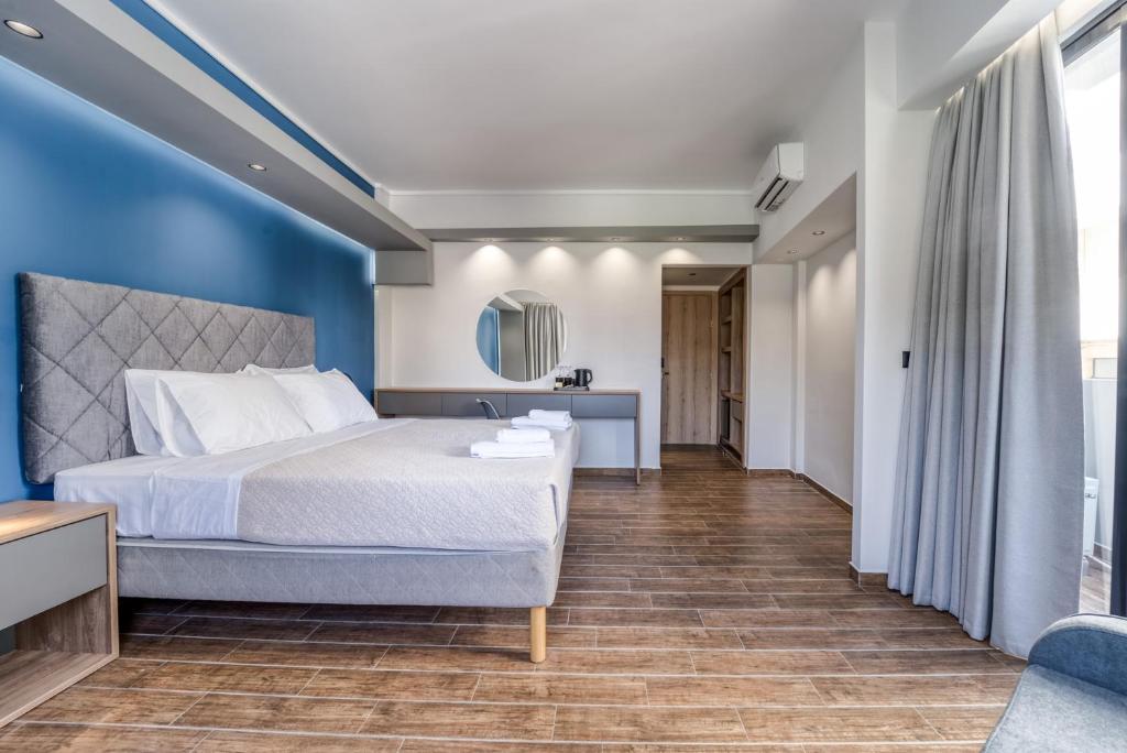 Postel nebo postele na pokoji v ubytování Island City Boutique Hotel