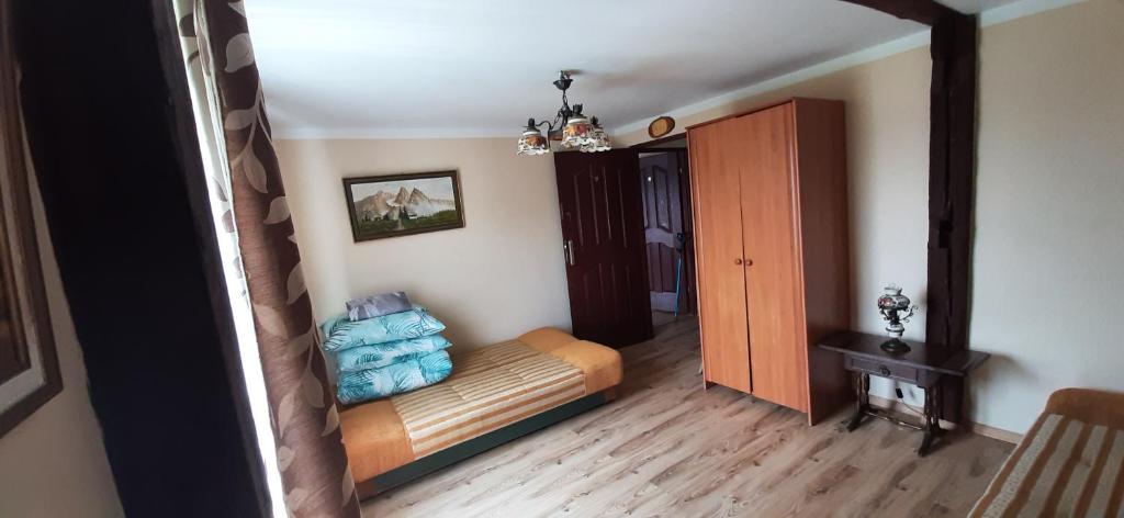 Posteľ alebo postele v izbe v ubytovaní AGROTURYSTYKA RASZKÓW
