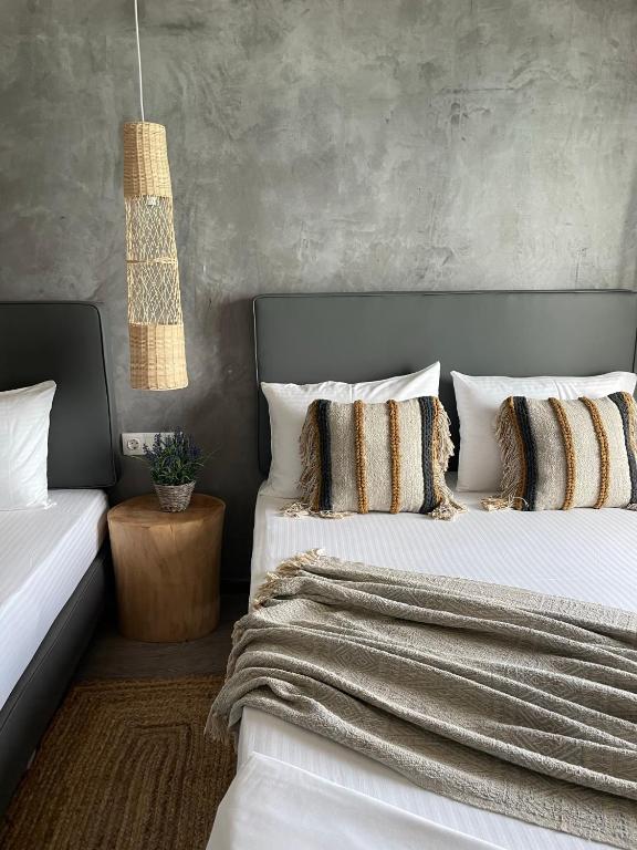 Postel nebo postele na pokoji v ubytování Xenios Hotel