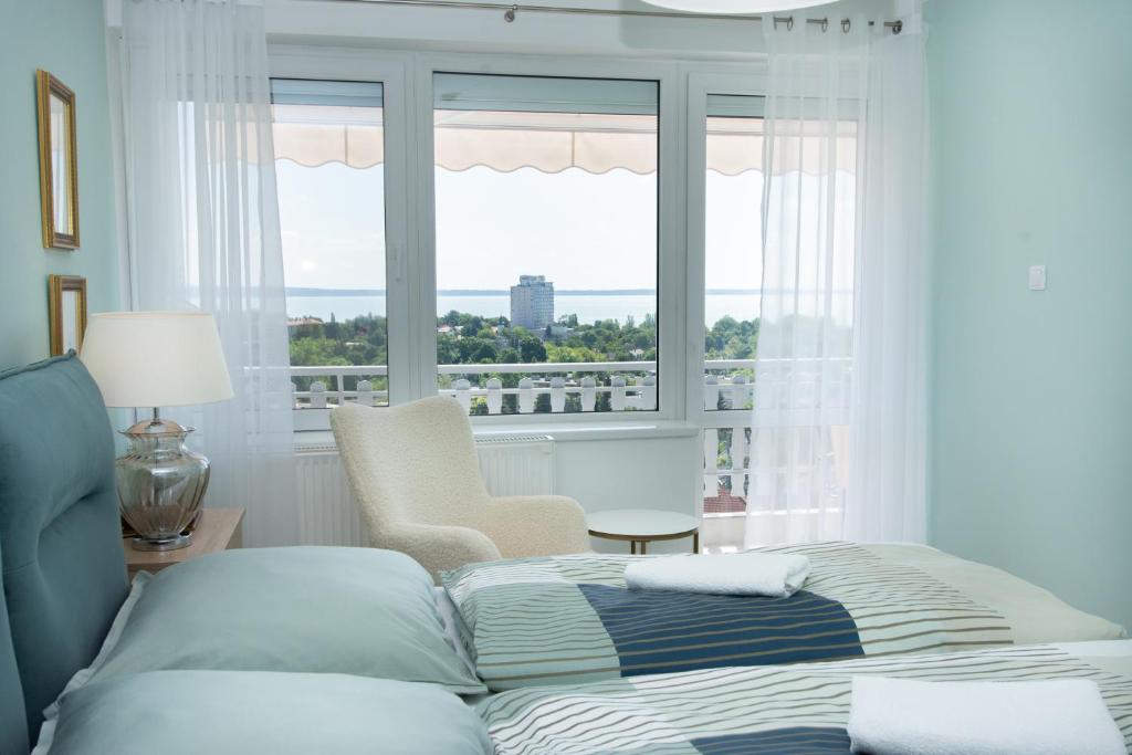 Postelja oz. postelje v sobi nastanitve Panorama Residence