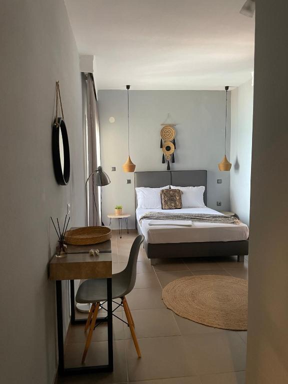 Postel nebo postele na pokoji v ubytování Xenios Hotel