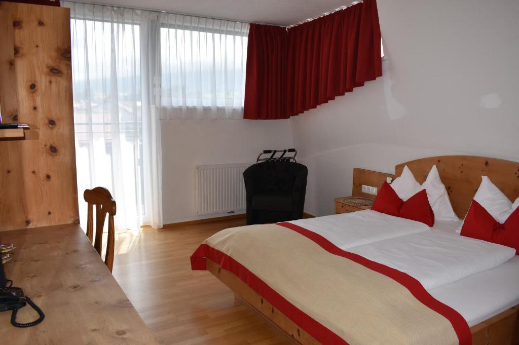 Postel nebo postele na pokoji v ubytování Hotel Kleißl