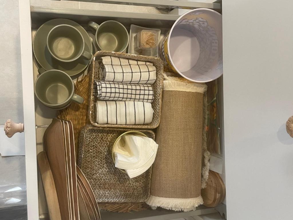 a drawer filled with lots of dishes and plates at Arcos de Tarifa, Casco historico in Tarifa