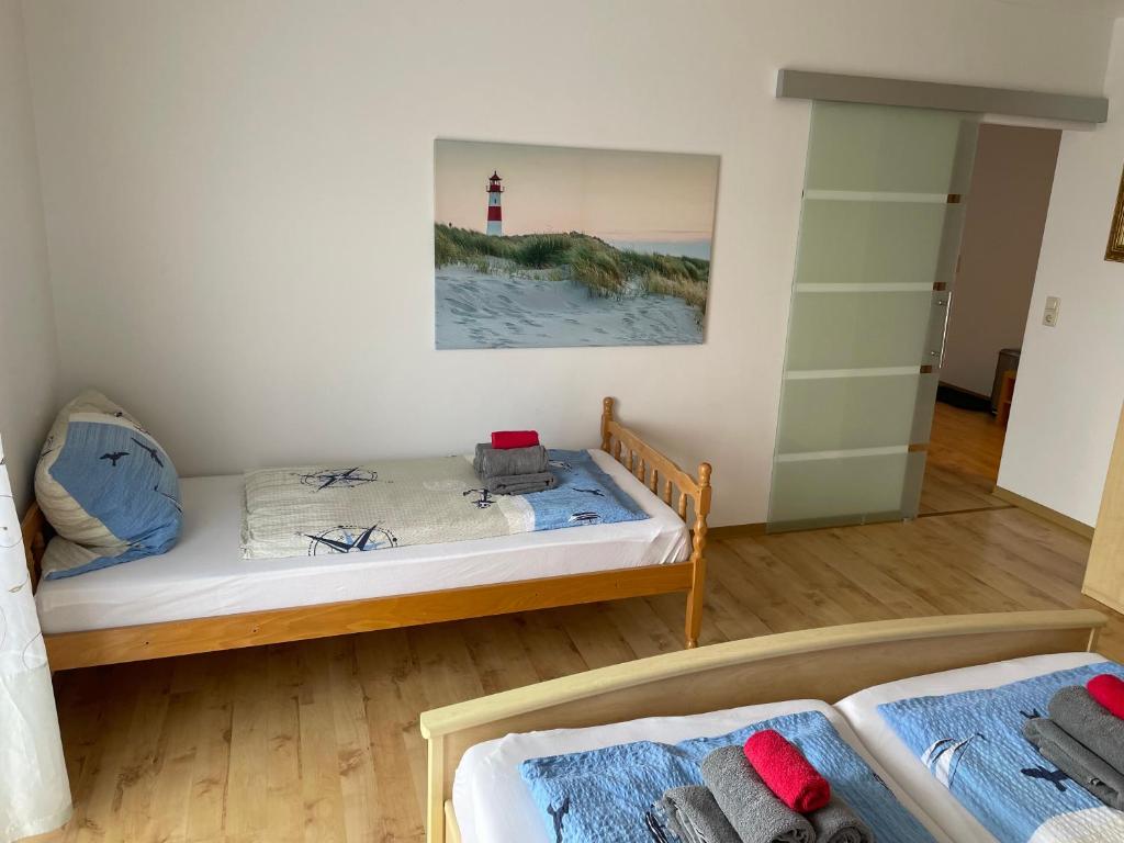 Postel nebo postele na pokoji v ubytování Pension Nordseebriese