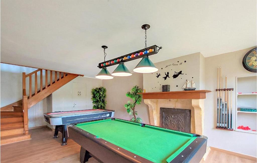 a living room with a pool table and a staircase at Beautiful Home In Boult-aux-bois With Wifi in Boult-aux-Bois