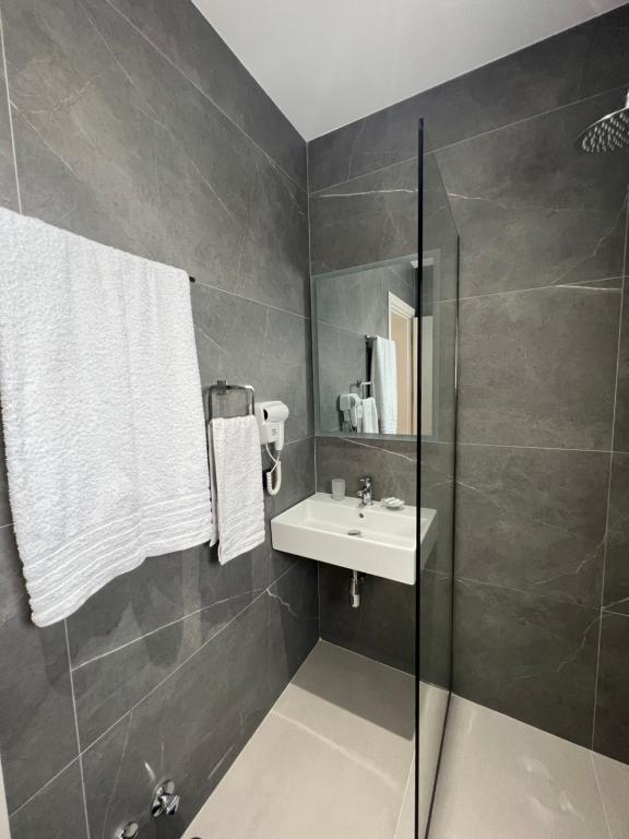 Koupelna v ubytování Astoria Rooms