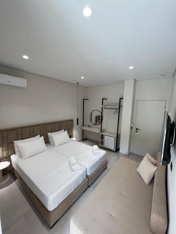 Postel nebo postele na pokoji v ubytování Astoria Rooms