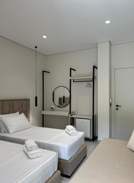 Postel nebo postele na pokoji v ubytování Astoria Rooms