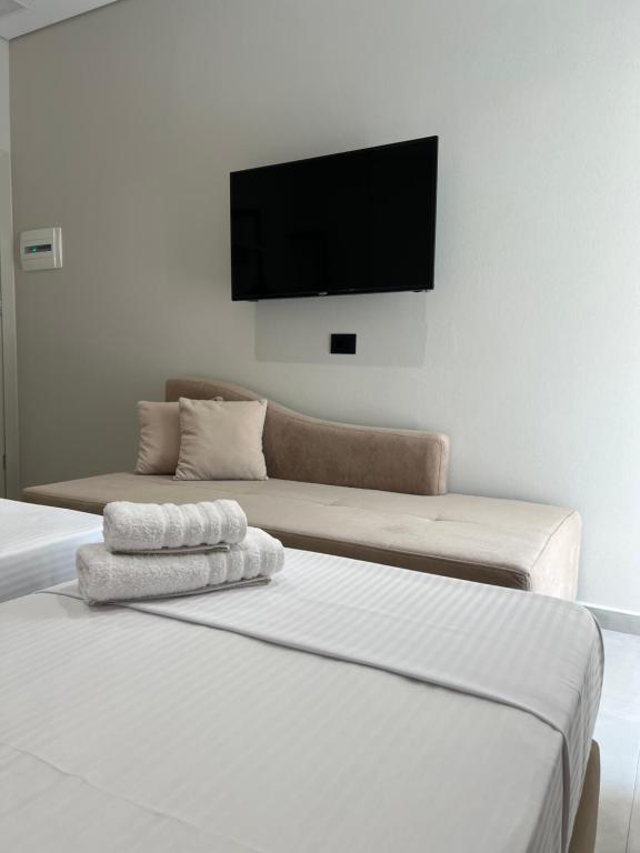 Postel nebo postele na pokoji v ubytování Astoria Rooms