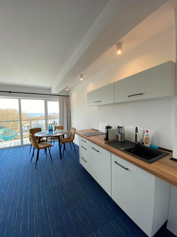 Kuchyňa alebo kuchynka v ubytovaní Apartamenty Mistral