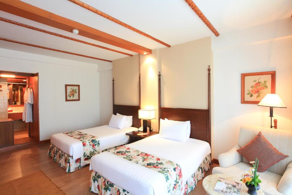 Postel nebo postele na pokoji v ubytování Belle Villa Resort, Chiang Mai