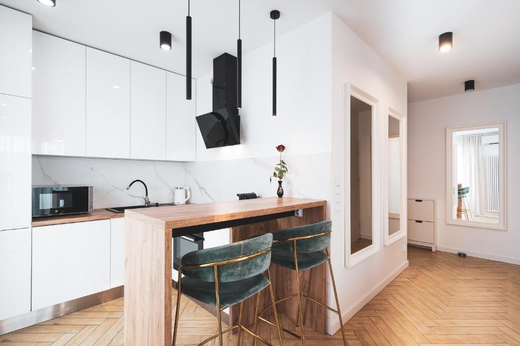Kuchyň nebo kuchyňský kout v ubytování Pure Rental Apartments Inżynierska