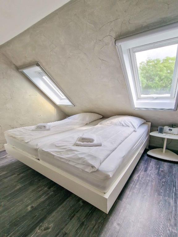 Postel nebo postele na pokoji v ubytování Storchennest