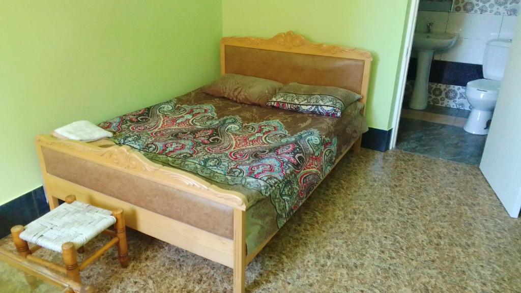 Postel nebo postele na pokoji v ubytování Sevan Garden Complex