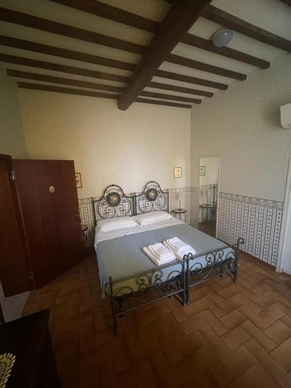 Posteľ alebo postele v izbe v ubytovaní Villa Remignoli