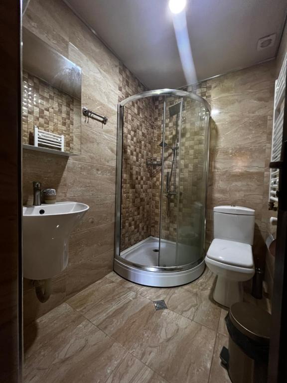 Koupelna v ubytování HOTEL MICHEL
