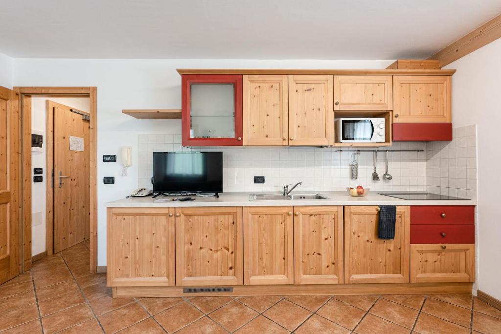 Kuchyň nebo kuchyňský kout v ubytování Gaia Residence Hotel