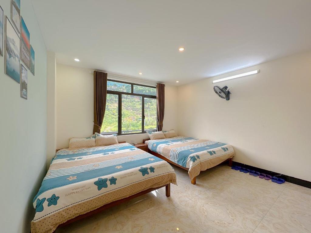 Postel nebo postele na pokoji v ubytování Ha Giang Ali Hostel