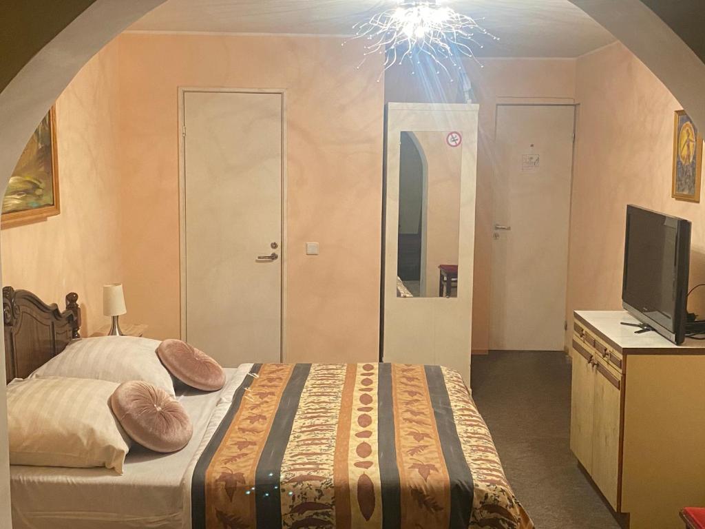 Postel nebo postele na pokoji v ubytování Hotel Getliin