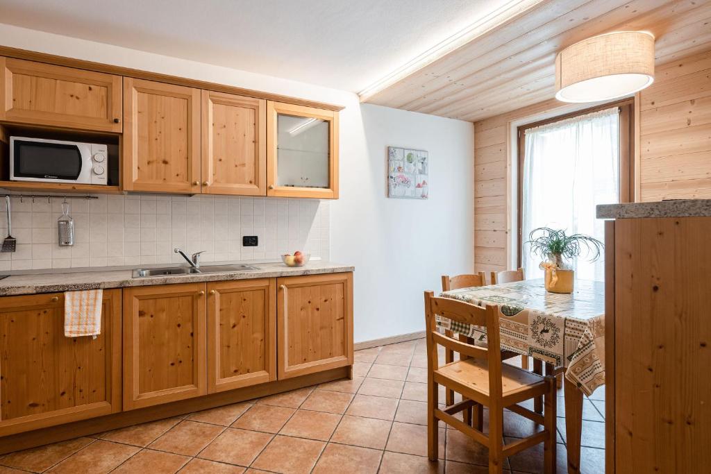 Kuchyň nebo kuchyňský kout v ubytování Gaia Residence Hotel