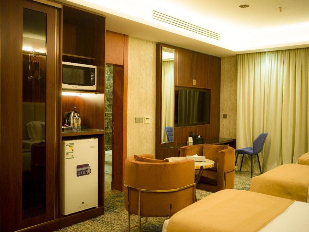 TV a/nebo společenská místnost v ubytování Sparrow Apartments Hotel