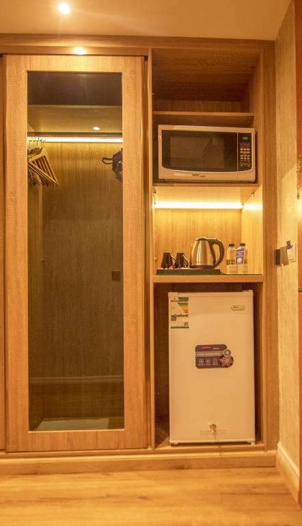 Kuchyň nebo kuchyňský kout v ubytování Sparrow Apartments Hotel