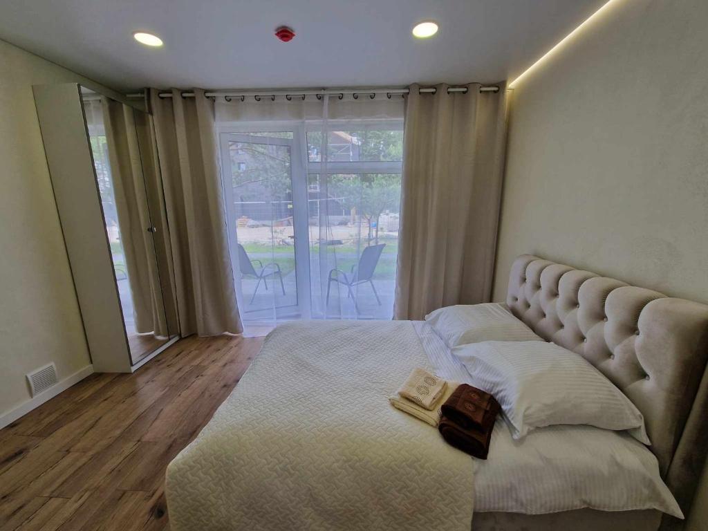 Кровать или кровати в номере 2rest