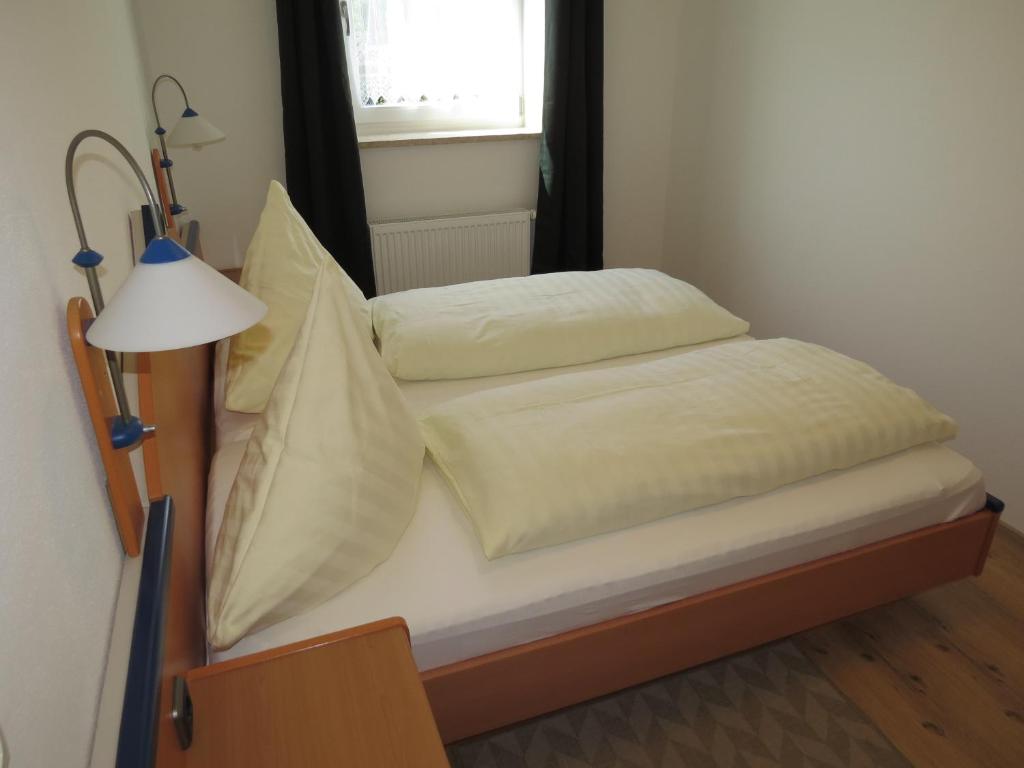 Postel nebo postele na pokoji v ubytování Büchelsteiner Hof