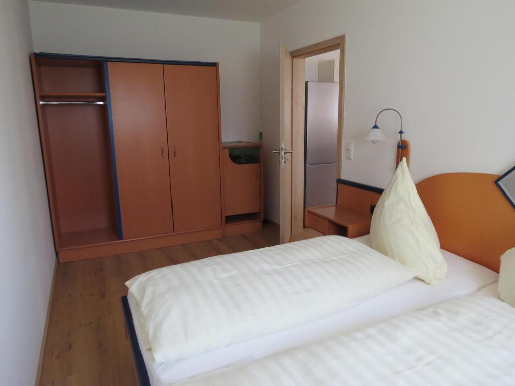 Postel nebo postele na pokoji v ubytování Büchelsteiner Hof