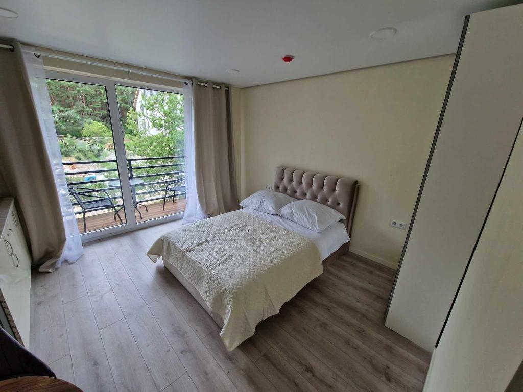 Кровать или кровати в номере 2rest