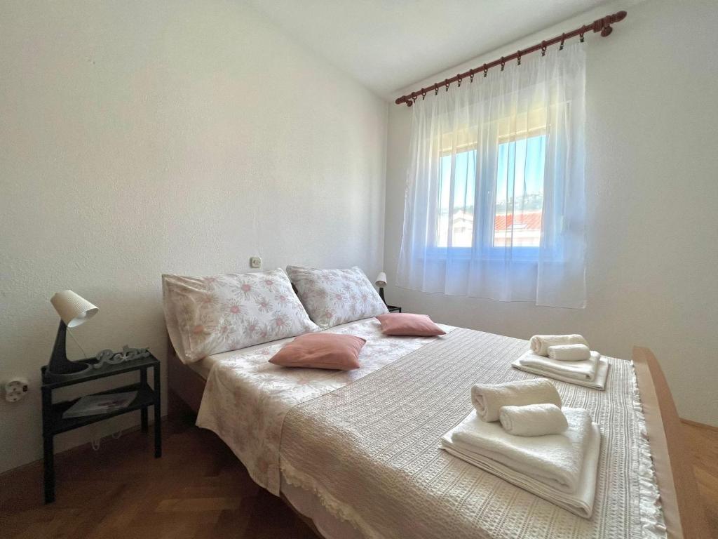 Posteľ alebo postele v izbe v ubytovaní Apartment Troisa