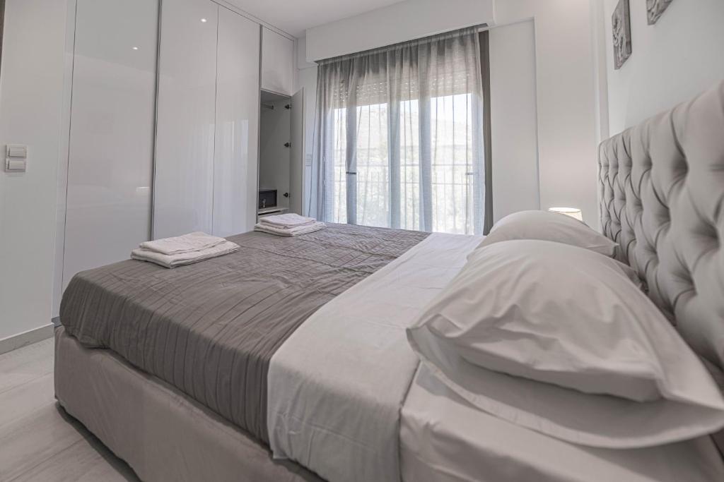 Postel nebo postele na pokoji v ubytování Demiani House