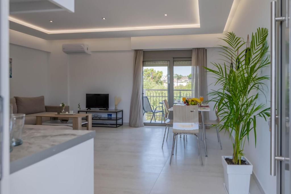 TV a/nebo společenská místnost v ubytování Demiani House